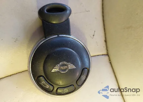 2011 Mini Cooper z USA, uszkodzony, nr VIN WMWZN3C51BT133009